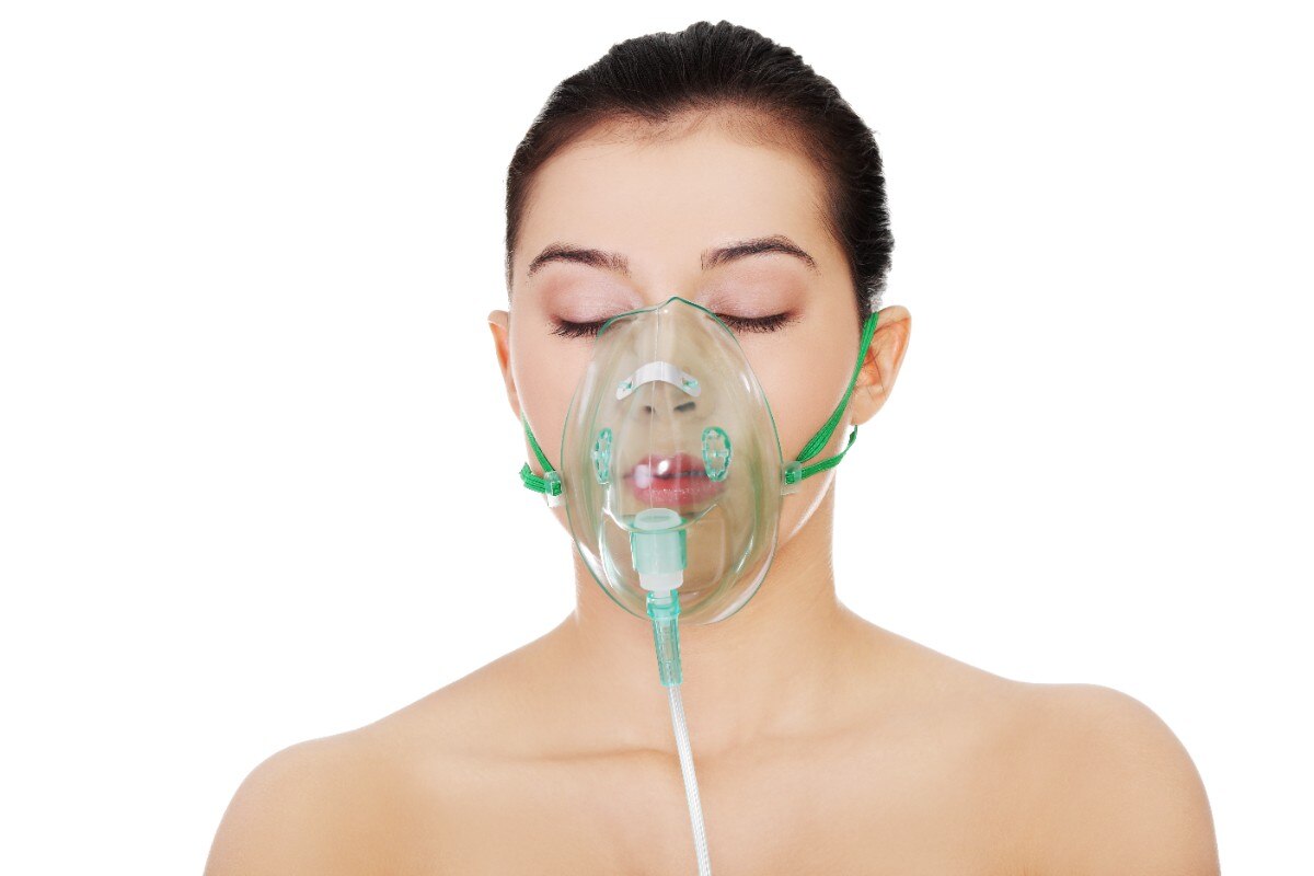 Diseased female patient wearing a oxygen mask; Shutterstock ID 225986401; Business Unit: Jones & Bartlett Learning; Project Name: ATI Fundamentals; ISBN or Project Number: ATI FUND; Element Number: Multiple images in Lesson-31, 32 & 34